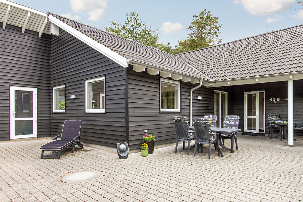 Genießen Sie einen Grillabend auf der Terrasse des Luxusferienhauses Nr. 171 in Ostjütland