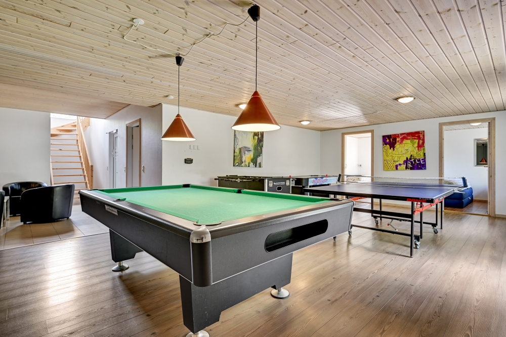 Neben den vielen schönen Stunden, die man im Poolbereich des Hauses verbringen kann, bietet das Luxusferienhaus 247 auch Spielevergnügen bei Billard/Tischtennis und Darts