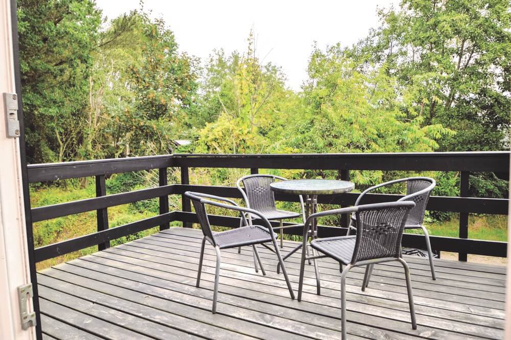 Genießen Sie einen Grillabend auf der Terrasse des Luxusferienhauses Nr. 199 in Westjütland