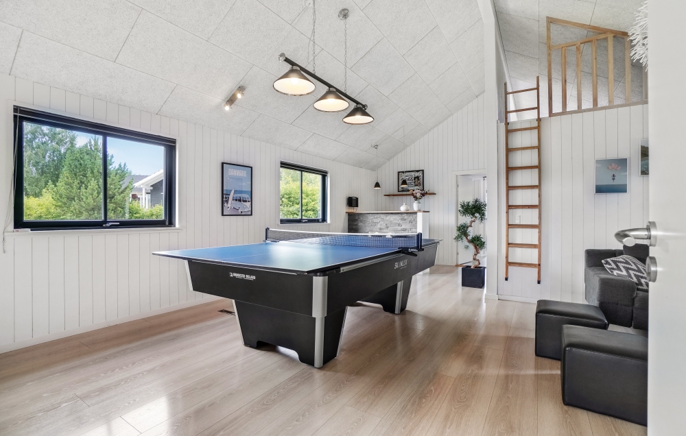 Das Luxusferienhaus 276 für 18 Personen hat einen großen Aktivitätsraum mit u. a. Billard und Darts