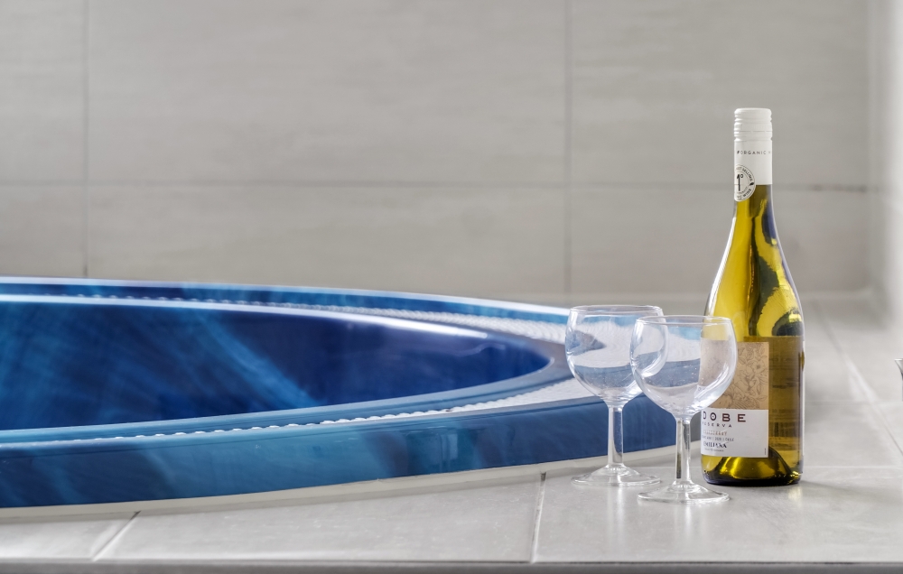 Genießen Sie den warmen Whirlpool im Luxusferienhaus Nr. 276 in Nordseeland