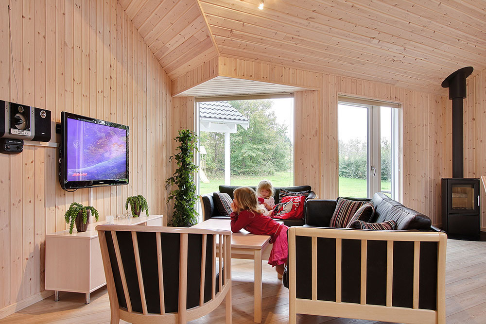 Das Haus verfügt über zwei gemütliche Sofagruppen mit Flachbildfernseher