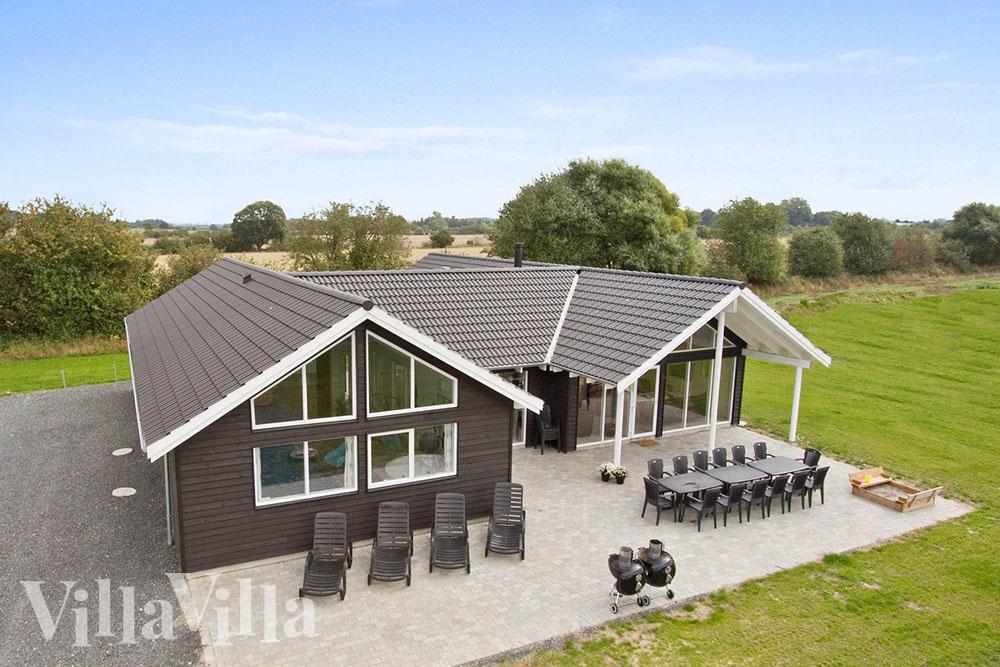Dieses Luxusferienhaus bei Skastrup auf Fünen hat Pool, Whirlpool und viele Aktivitäten wie Tischtennis und Darts 