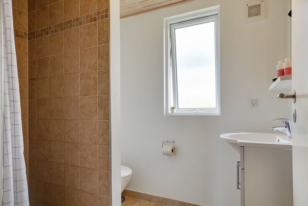Eines der Badezimmer im Luxusferienhaus Nr. 285