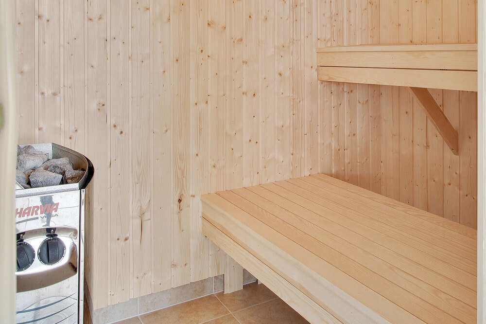 Genießen Sie die heiße Sauna im Luxusferienhaus Nr. 285 für 18 Personen