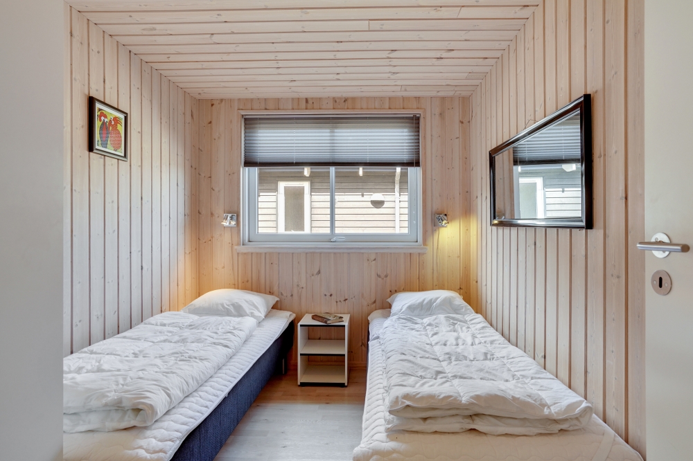 Eines der 7 Schlafzimmer im Luxusferienhaus Nr. 273